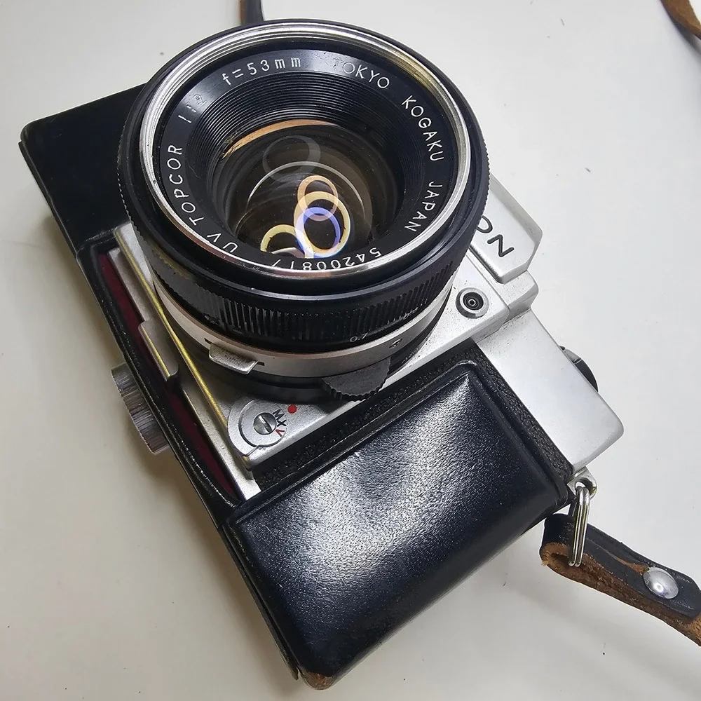 Vintage Topcon Uni 35mm SLR Camera with UV Topcor 53mm f2 Lens and Case Untested